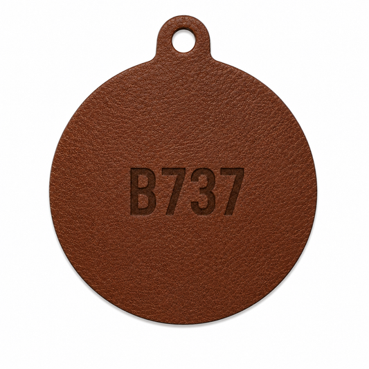 Born in the sky. Flying forever. | Boeing 737 Leather Keychain